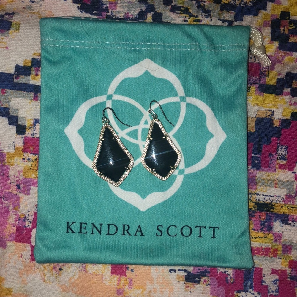 Kendra Scott black earrings.